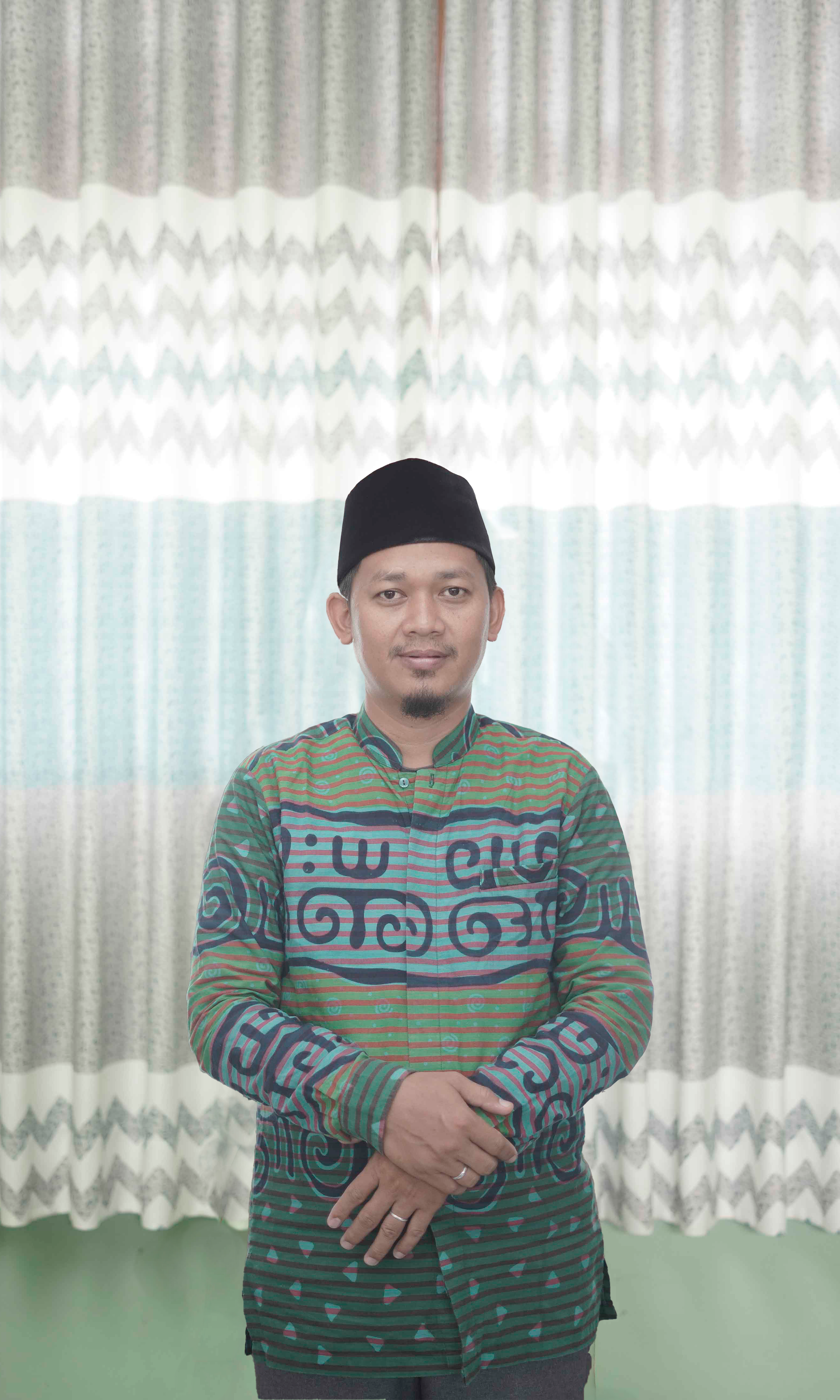 Mahrus, S.Pd.I., M.Pd.